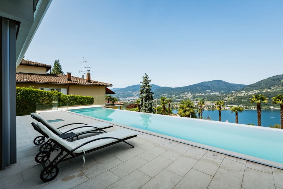 Infinity pool overlooking green hills